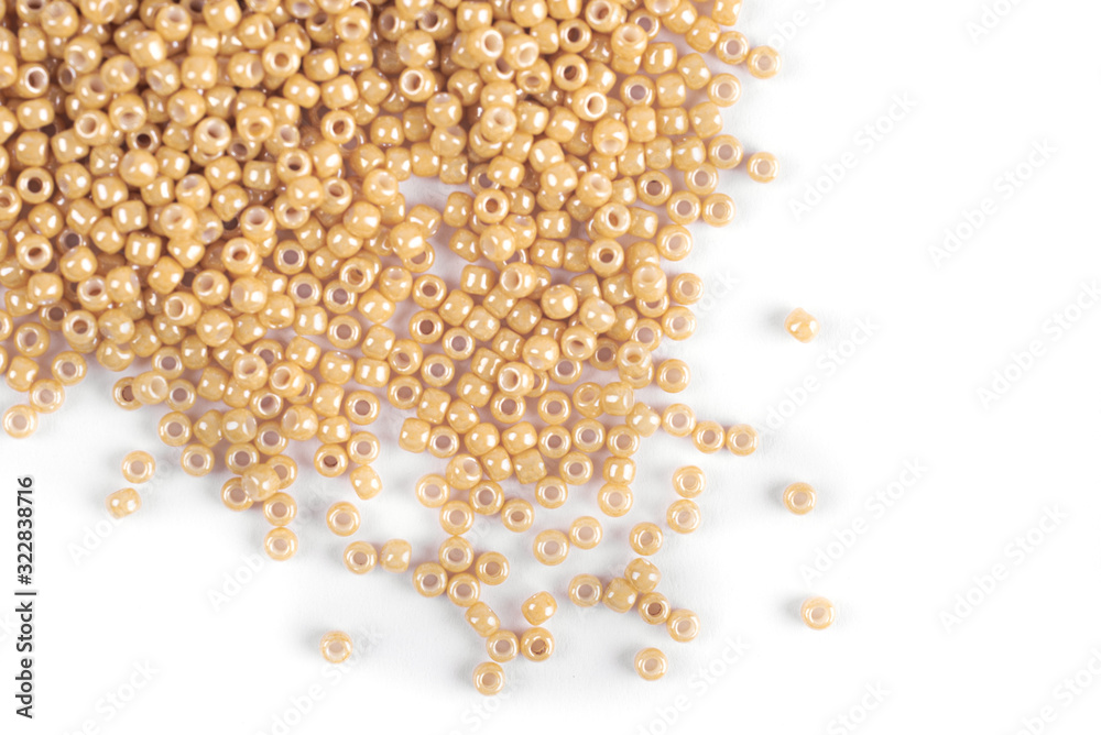 Scattering of colored beads on a white background Scattering of colored beads on a white background