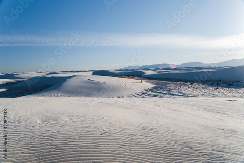 A man walking in the distance at White Sands National Park in Alamogordo, New Mexico.  © Rosemary