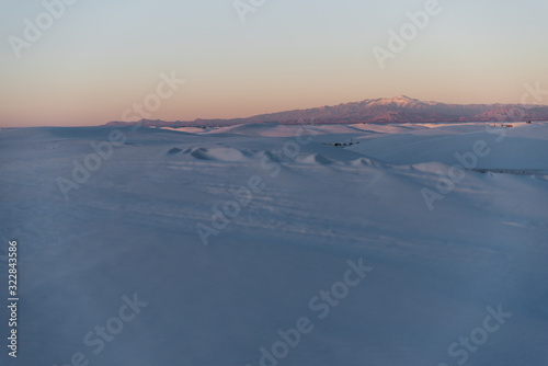 Sierra Blanca during sunset at White Sands National Park in Alamogordo, New Mexico. 