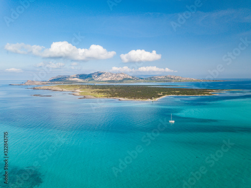 Aerial View of the Beautiful Stintino Beach With tower and The island of Asinara in Background