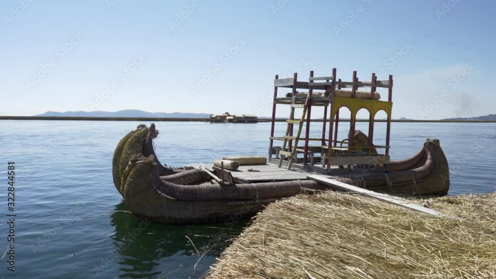 Traditional Totora reed boat at Uros floating islands on Lake Titicaca ...