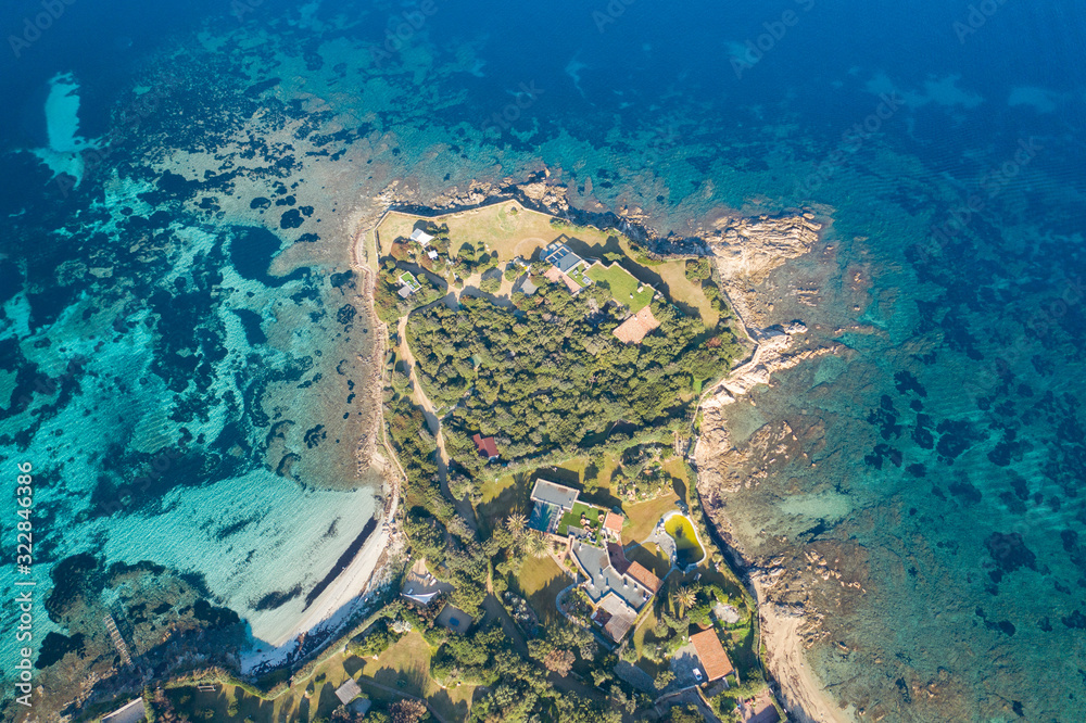 aerial view of a villa in front the sea