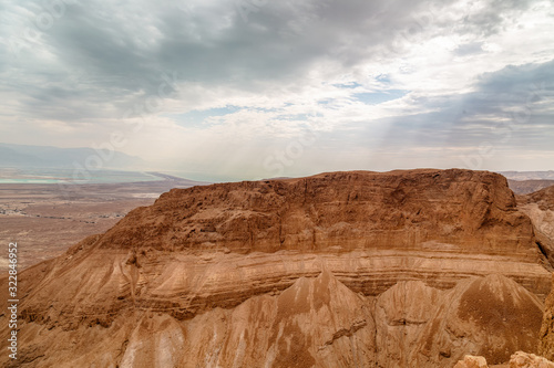 A mountain in the desert close to the dead sea in Israel photo