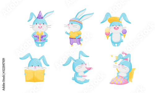 Cute Rabbit with Blue Coat Drinking Hot Tea and Reading Book Vector Set