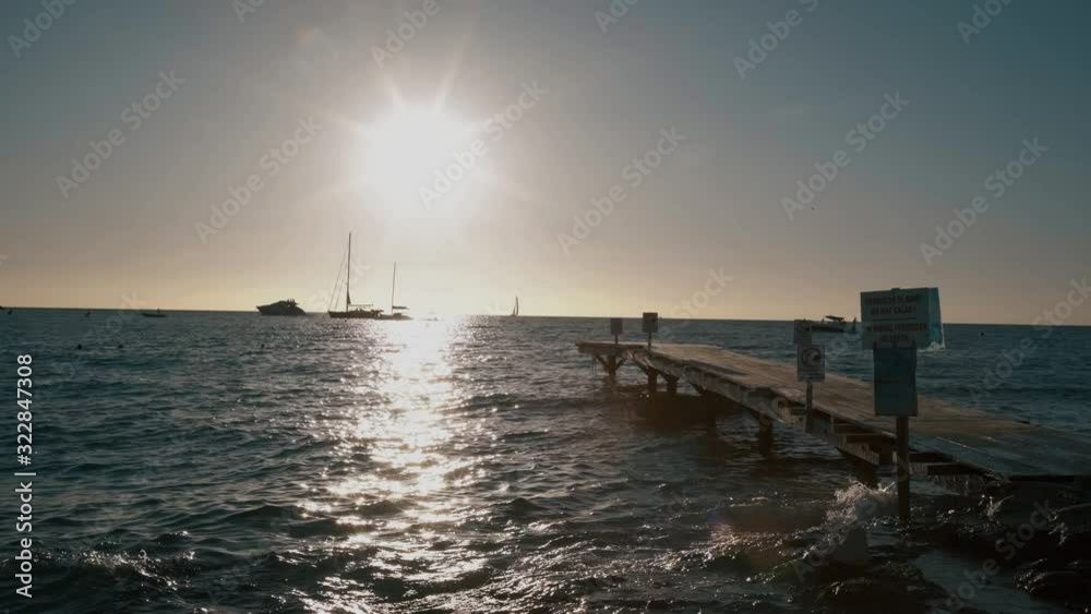 Balearic Island Formentera Sunset behind Wooden Pier Balearic Island Formentera Sunset behind Wooden Pier