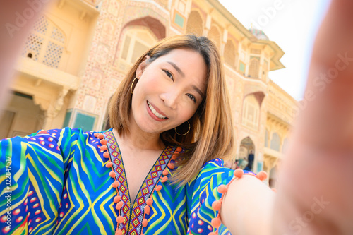 Photography Young woman colorful dress selfie herself in amber palace in Jaipur, rajasthan,