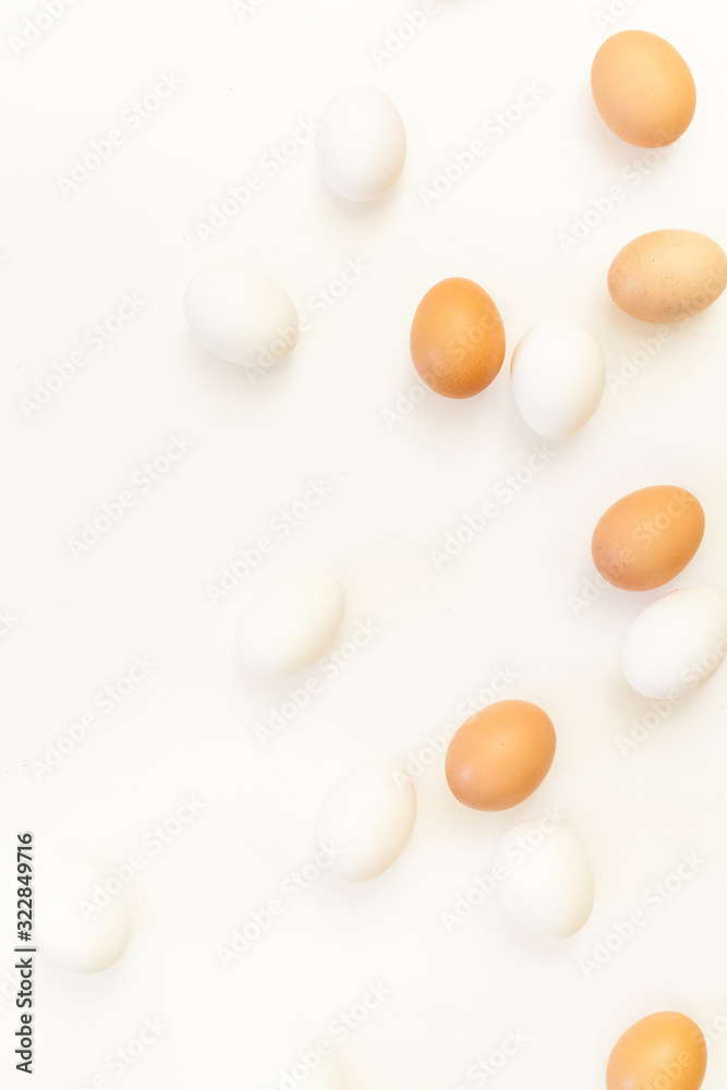 white and brown chicken eggs on white background with plenty of space, copy space, laboratory for health and control, biological, hygienic examination cut out