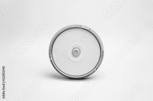 Close compact plastic disc box case with white isolated blank for branding design. CD jewel mock-up on soft gray background. DVD or CD disc