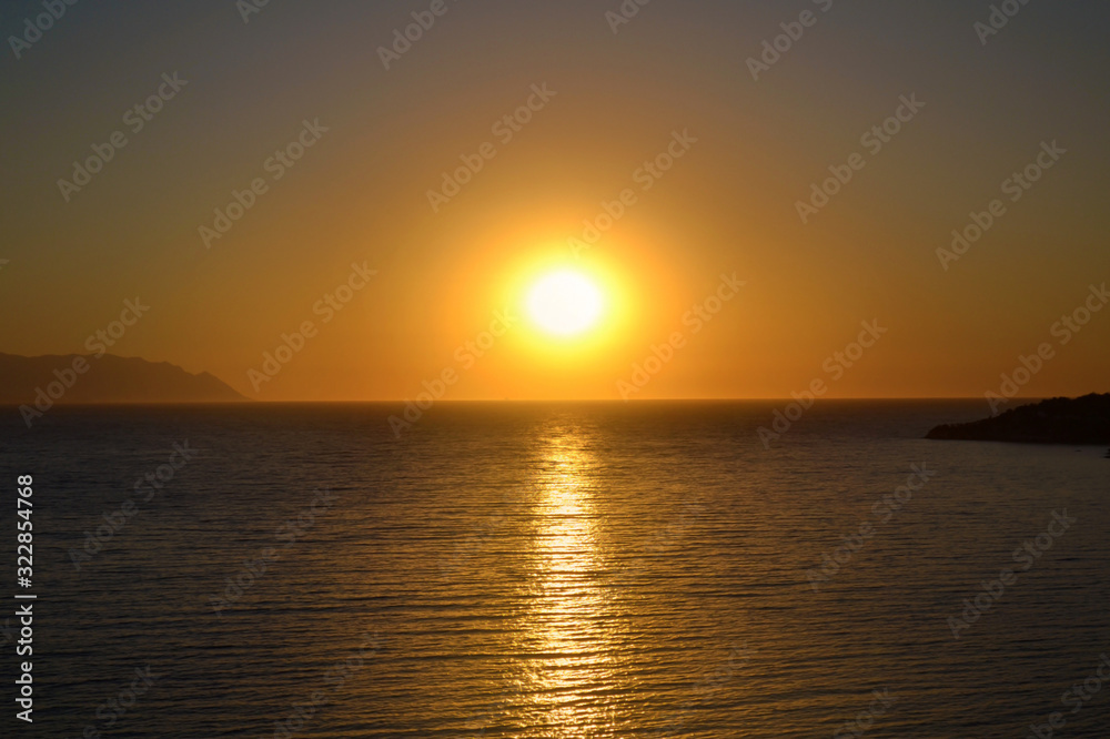 Beautiful Golden Sunset over the Sea .Sea Landscape with Orange Sun Beautiful Golden Sunset over the Sea .Sea Landscape with Orange Sun