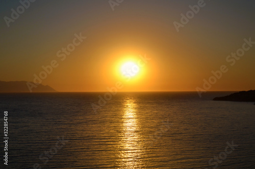 Beautiful Golden Sunset over the Sea .Sea Landscape with Orange Sun 