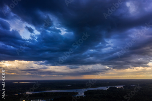 Aerial view of heavy thunderclouds over the forest of Karelia