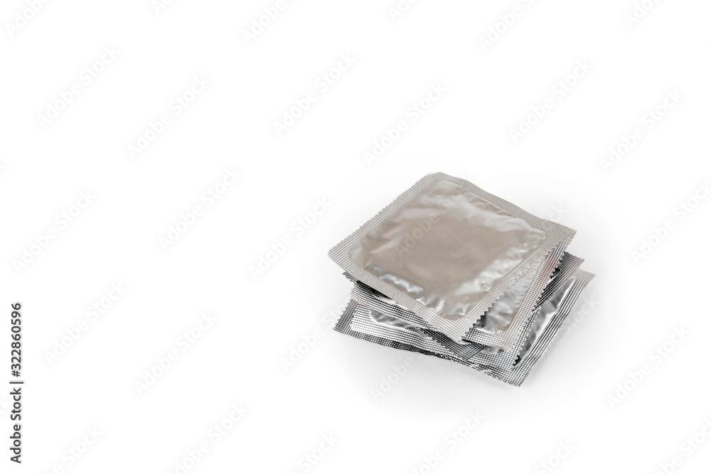 Background of condoms. condoms on a white background Background of condoms. condoms on a white background