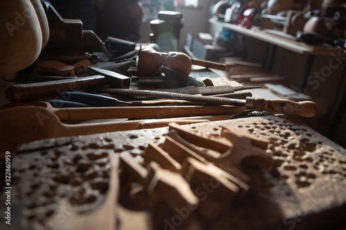 Workshop of professional Tar master artisan detailed work on wood violin in a workshop. Azerbaijan traditional instrument.