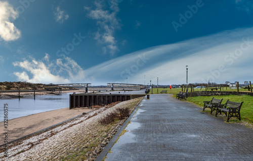 Irvine Harbour in Ayrshire Scotland looking in towards the Town Centre Past the Old Ruins that were the Museum Iron Bridge. © James