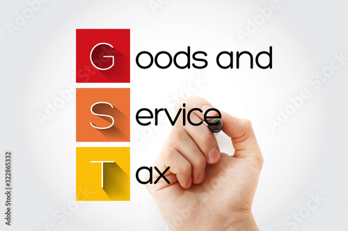 GST - Goods and Service Tax acronym, business concept background
