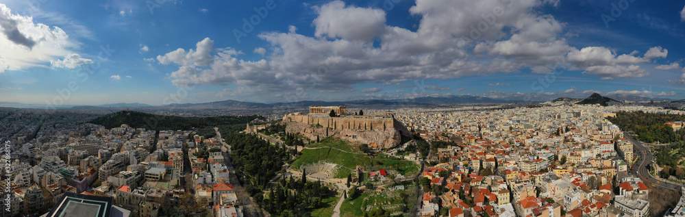 Aerial drone panoramic photo of urban city of Athens and famous Acropolis hill and the Parthenon, Attica, Greece
