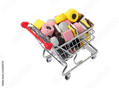 Shopping cart filled with assorted English liquorice candy