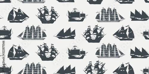 Vector seamless pattern on the theme of nautical travel, adventure and discovery with silhouettes of various sailing ships in retro style. Suitable for background, wallpaper, wrapping paper, fabric