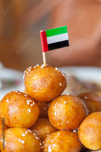 Delicious traditional middle eastern sweet made of fried dough lokma, luqaimat photo