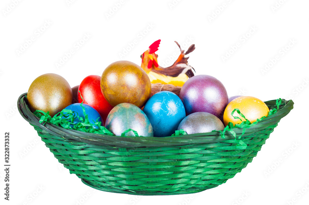 Eastern basket will colored eggs and chicken isolated on white background
