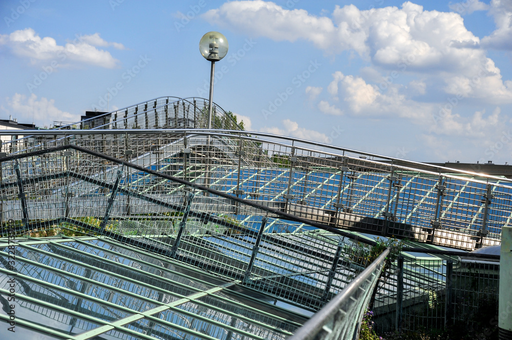 Naklejka premium Arc polycarbonate canopy and reinforced concrete construction