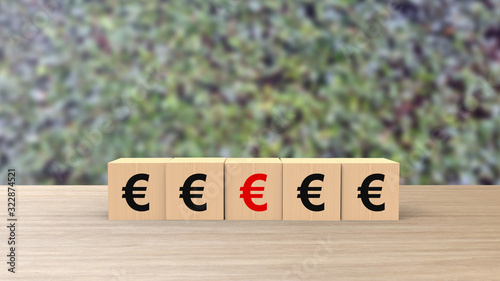 € euro sign symbol word wooden cubes on table horizontal over blur background with climbing green leaves, mock up, template, banner with copy space for text, Risk management business financial. bank photo