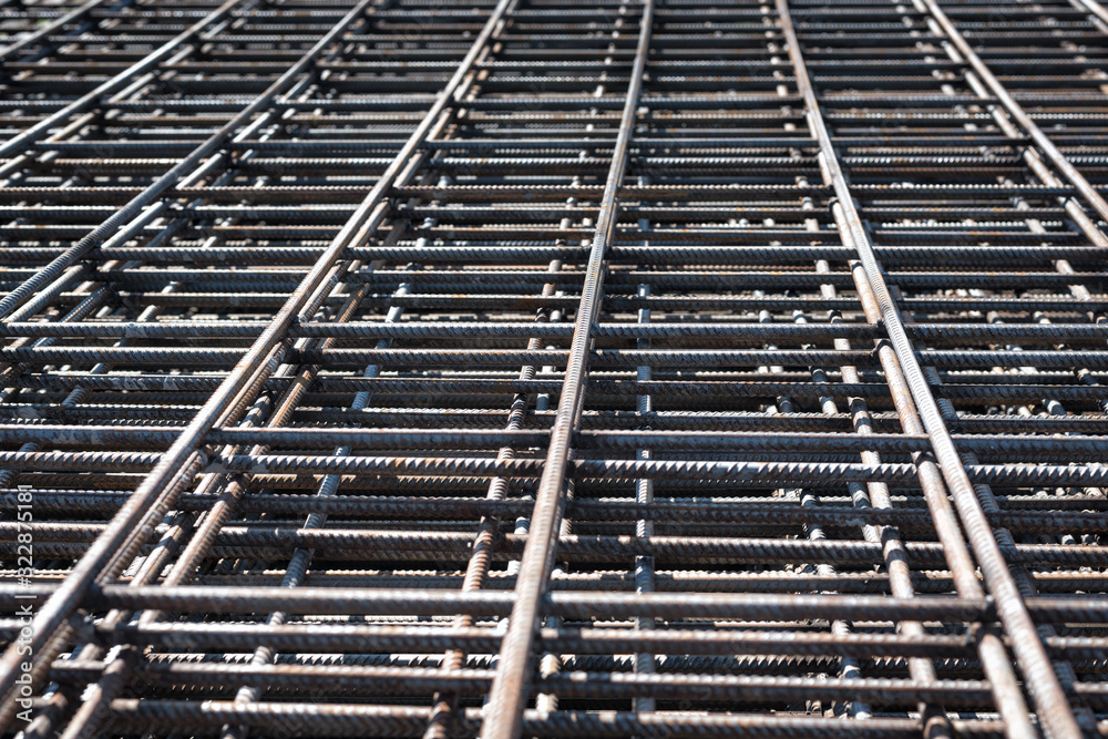 Steel Rebars for reinforced concrete construction site. Piled iron reinforcement workpieces.