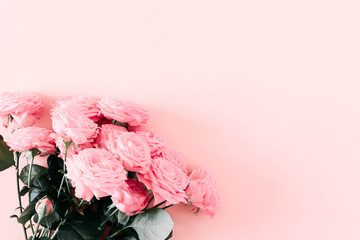 Beautiful flowers composition. Pink  rose flowers on pastel pink background. Valentines Day, Easter, Birthday, Happy Women's Day, Mother's day. March 8. Flat lay, top view, copy space