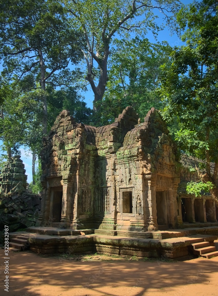 Eastern entrance to the main gallery of Ta Prohm temple ruins, located in the Angkor Wat complex near Siem Reap, Cambodia.