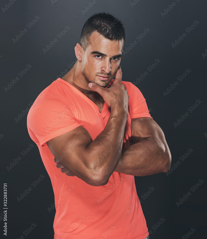 Handsome Athletic Male Fashion Model Looking at Camera Handsome Athletic Male Fashion Model Looking at Camera