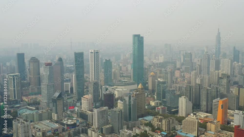 flight over nanjing city sunny sunset downtown famous towers aerial panorama 4k china flight over nanjing city sunny sunset downtown famous towers aerial panorama 4k china