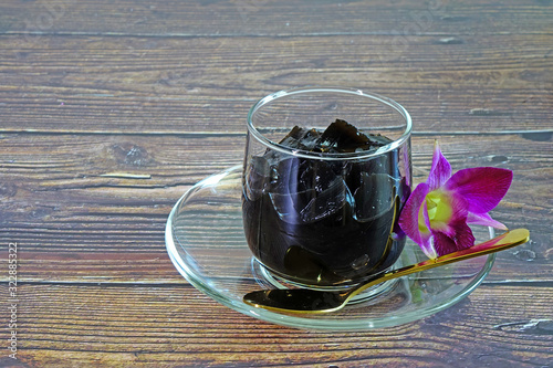 Grass jelly, or leaf jelly or herb jelly, is a jelly-like dessert eaten in East Asia (mainly in China and Southeast Asia). It is created by using the herbs name Platostoma palustre. Selective focus photo