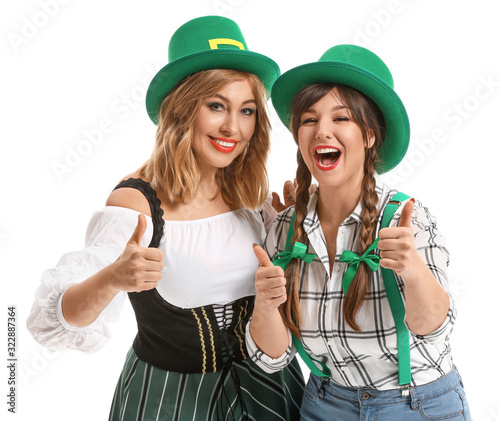 Funny young women showing t...