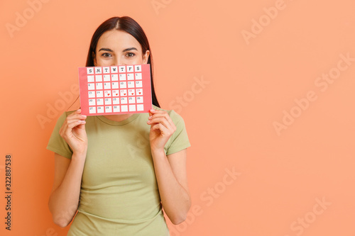 Young woman with menstrual ...