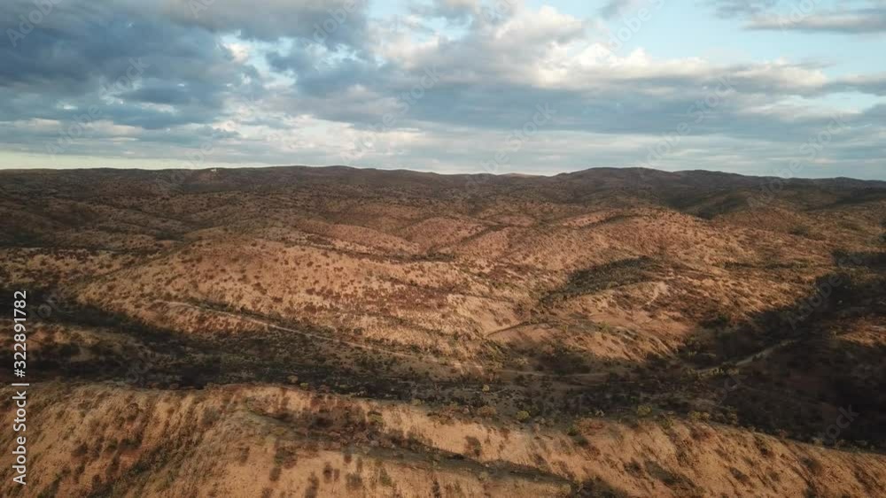 4K aerial drone summer day video African savanna and dry riverbeds surrounded by bush covered hills in Daan Viljoen National Game Park in Khomas Hochland area near Windhoek, Namibia's capital, Africa 4K aerial drone summer day video African savanna and dry riverbeds surrounded by bush covered hills in Daan Viljoen National Game Park in Khomas Hochland area near Windhoek, Namibia's capital, Africa