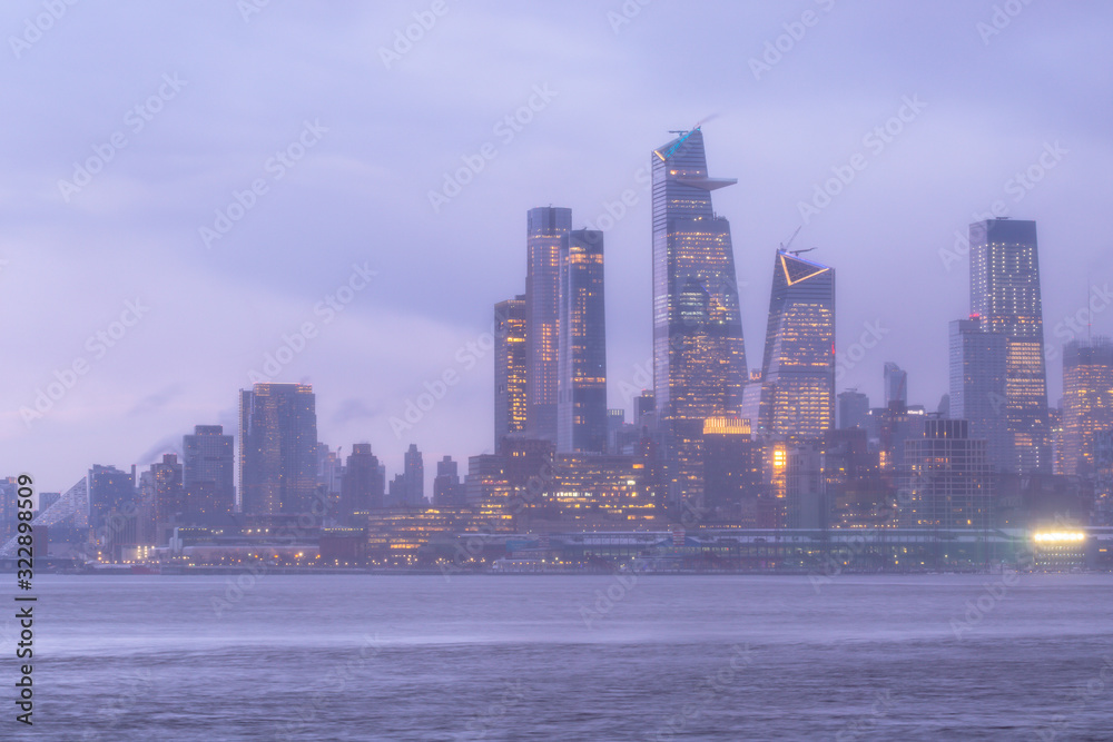 View on Hudson Yards from Hudson river after the storm with long exposure View on Hudson Yards from Hudson river after the storm with long exposure