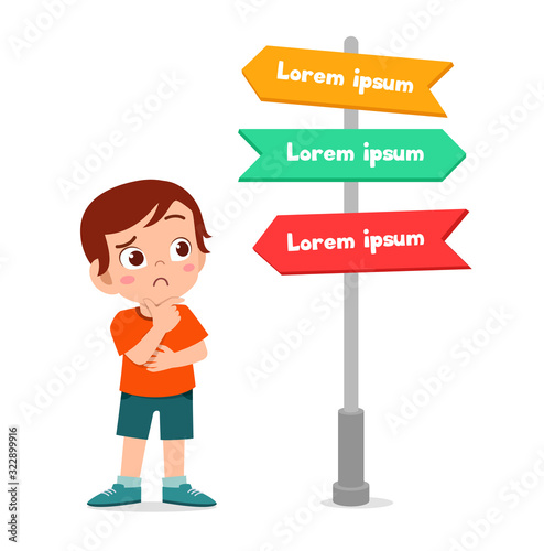 happy cute little kid boy with sign arrow