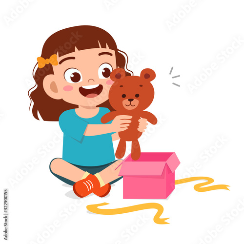 happy cute little kid girl open gift birthday