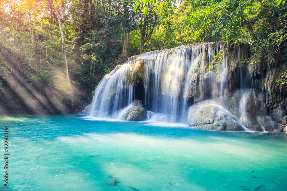 Waterfall, green forest in Erawan National Park, Thailand. Landscape with water flow, river, stream and rock at outdoor. Beautiful scenery of nature for tourist to tour, visit, relax in vacation. Waterfall, green forest in Erawan National Park, Thailand. Landscape with water flow, river, stream and rock at outdoor. Beautiful scenery of nature for tourist to tour, visit, relax in vacation.