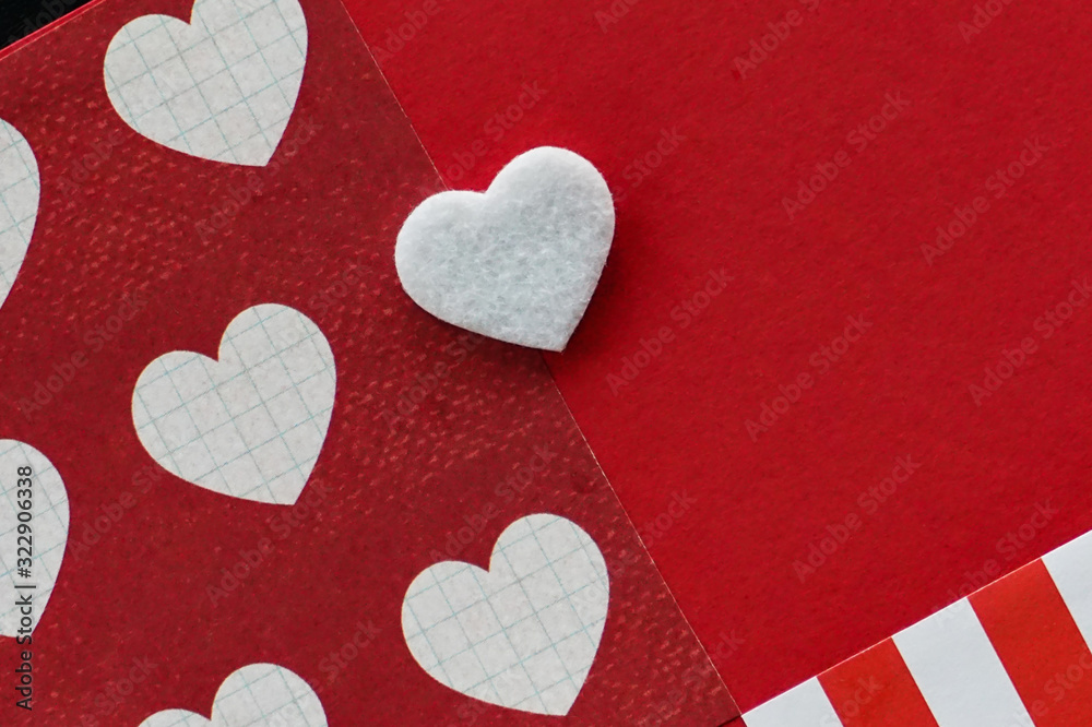 White hearts on bright red background, symbol of love, romance