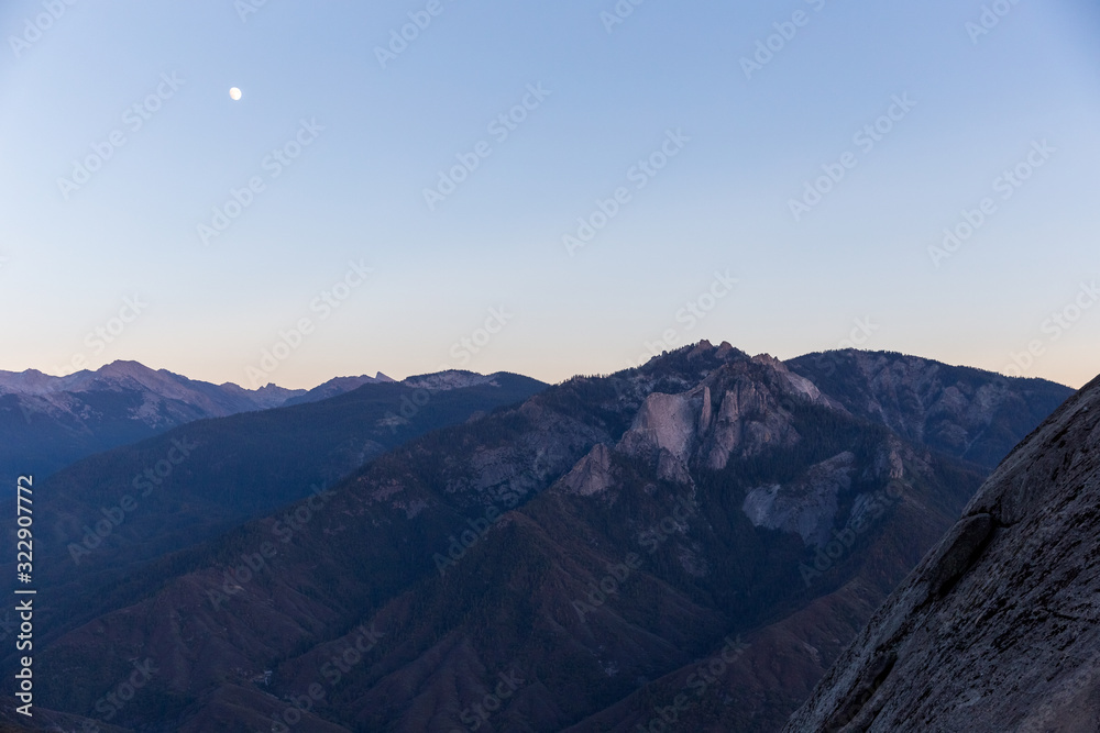 mountain tops and moon at dusk in Sequoia National Forest, California