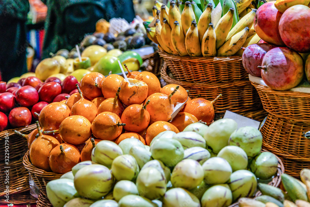 Fresh exotic fruits on famous market in Funchal Mercado dos Lavradores Madeira island, Portugal Fresh exotic fruits on famous market in Funchal Mercado dos Lavradores Madeira island, Portugal
