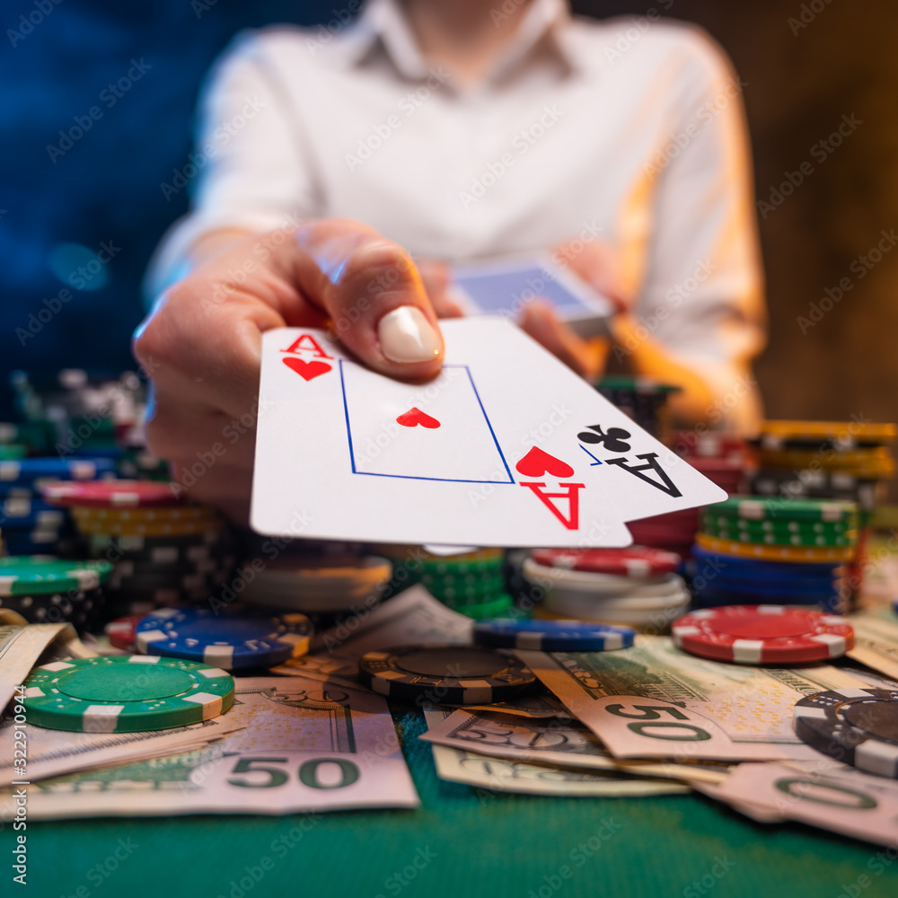 Obraz premium Poker game in a casino, online gaming business. Success and big win. Money, chips. Square photo.