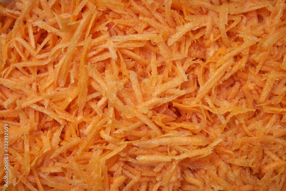 Grated carrot, for backgrounds or textures Grated carrot, for backgrounds or textures