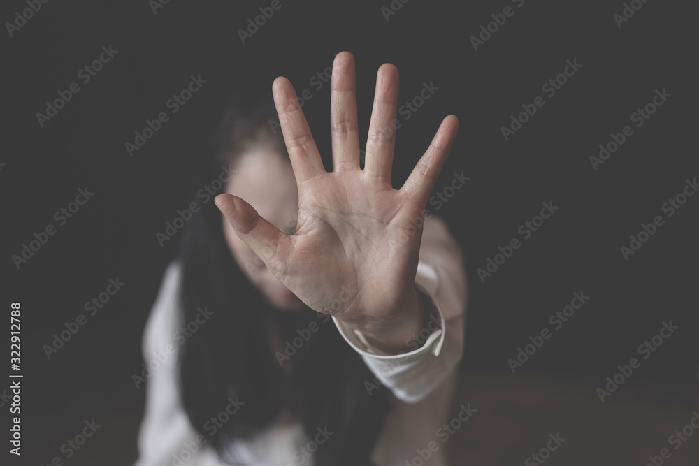 Stop violence against women.woman showing her denial with on her hand Stop violence against women.woman showing her denial with on her hand