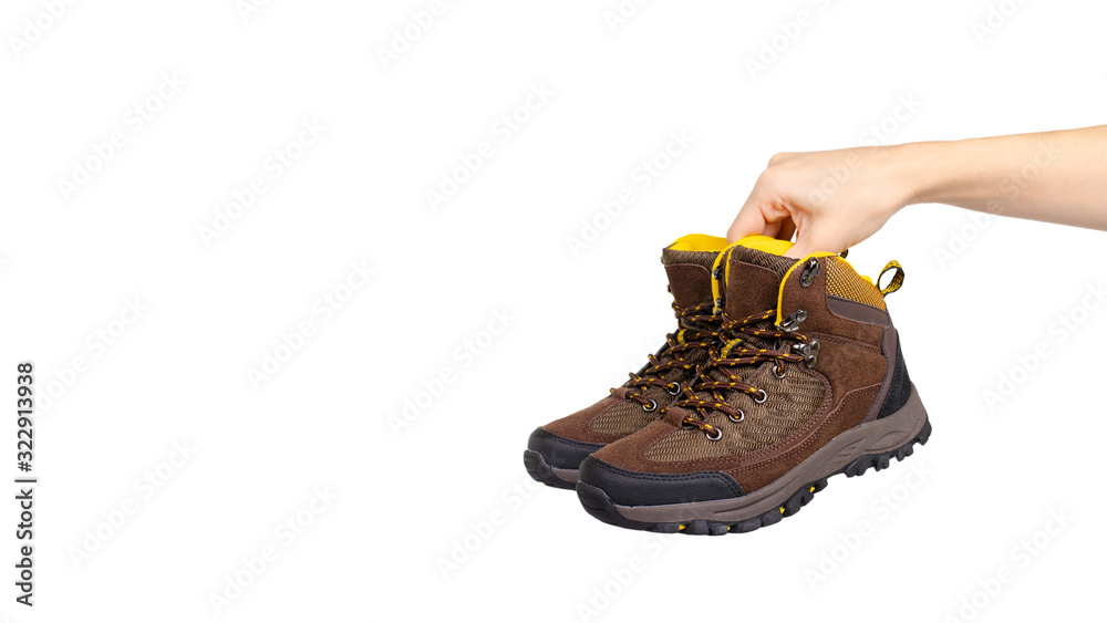 Brown leather kids boots. Isolated on white. Brown leather kids boots. Isolated on white.