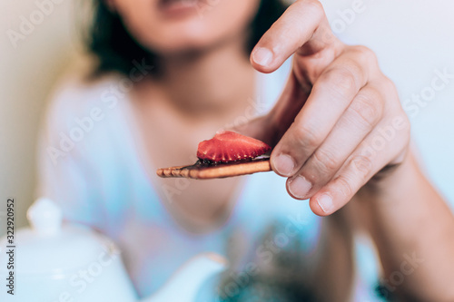 woman eating bitscuit. 