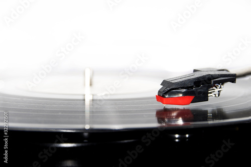 Vinyl turntable on a white background. Retro audio equipment for vinyl disk.