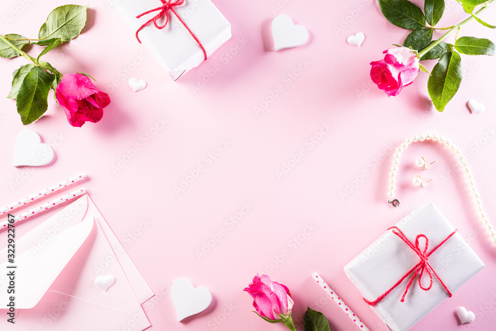 International Women's Day concept. Woman lace lingerie jewelry perfume present with pink roses on bright pink pastel background. flat lay, March 8. International Women's Day concept. Woman lace lingerie jewelry perfume present with pink roses on bright pink pastel background. flat lay, March 8.