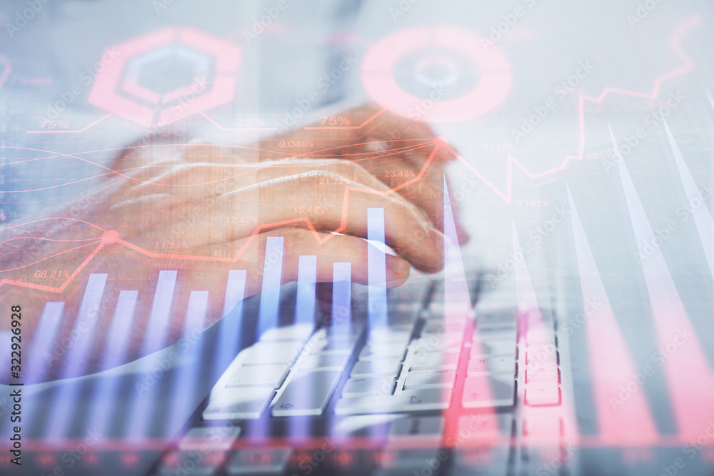 Multi exposure of graph with man typing on computer in office on background. Concept of hard work. Closeup. Multi exposure of graph with man typing on computer in office on background. Concept of hard work. Closeup.